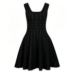 Black knit flared dress with pearl embellishments