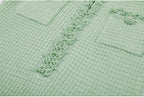 Mint green dress upper front with detailed pearl decorations