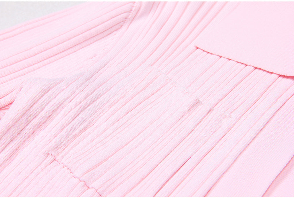Close-up of dress front pockets and chest detail