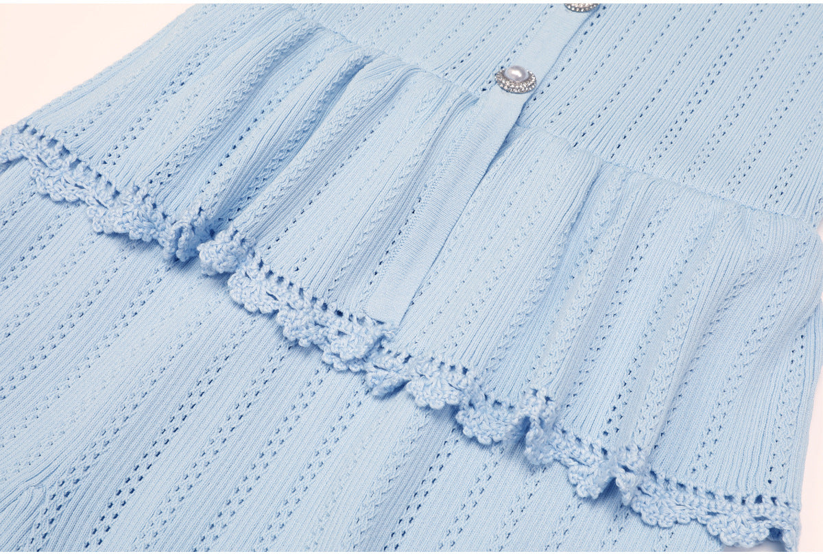 Blue peplum waist and lace trim detail of dress