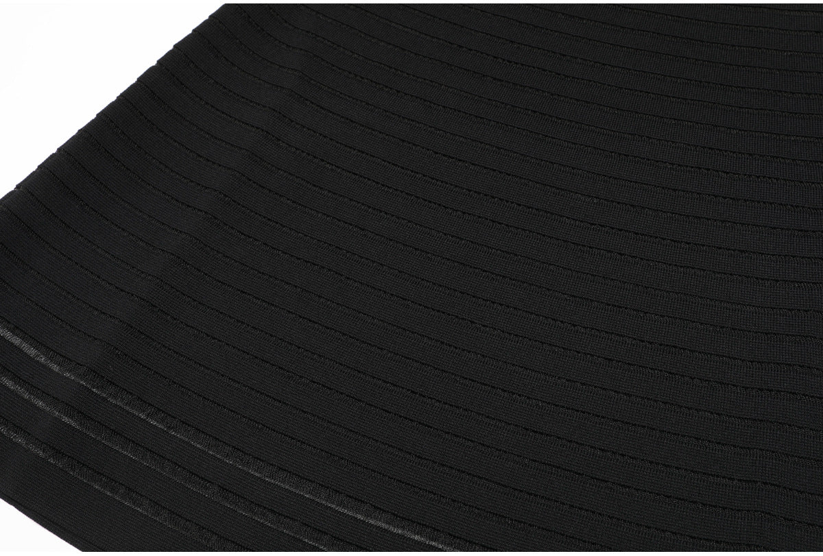 Close-up of black knit fabric with horizontal stripes