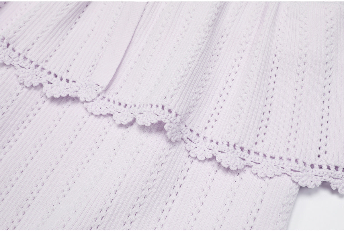 Lilac peplum waist and lace trim detail of dress