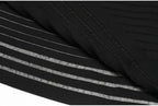 Hem and fabric fold detail of black striped knit dress