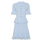 Blue knit peplum midi dress with lace hem and pearl buttons