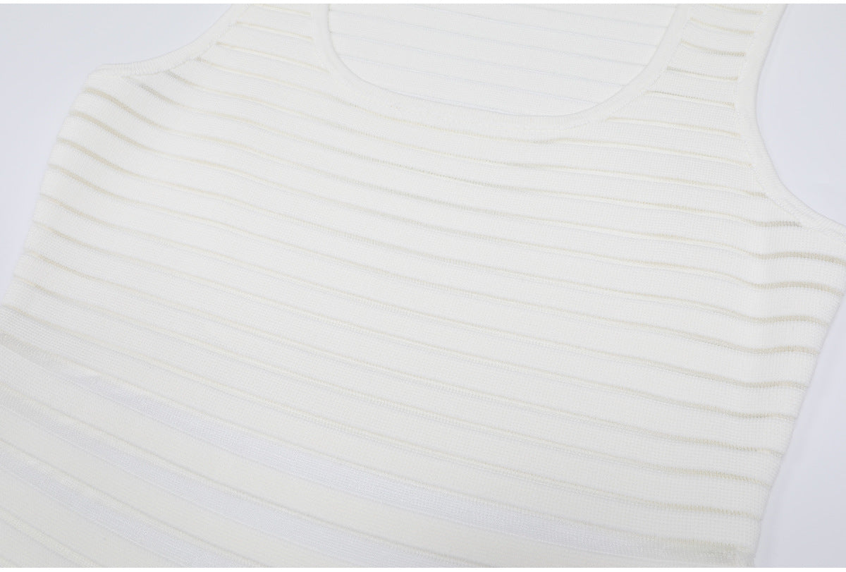 Upper bodice detail of white striped knit dress