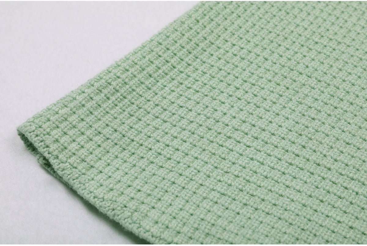 Mint green textured knit dress fabric detail