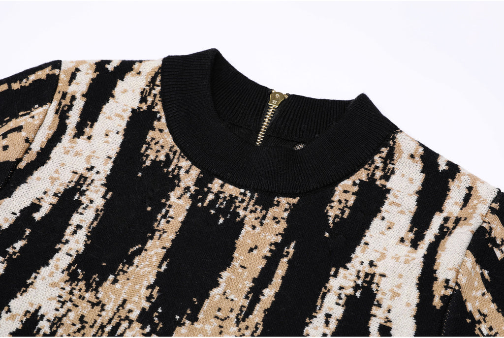 Detail of ribbed neckline and zipper on jacquard knit dress