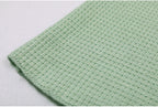 Mint green textured knit hem detail