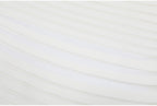 Lower skirt detail of white striped knit dress fabric