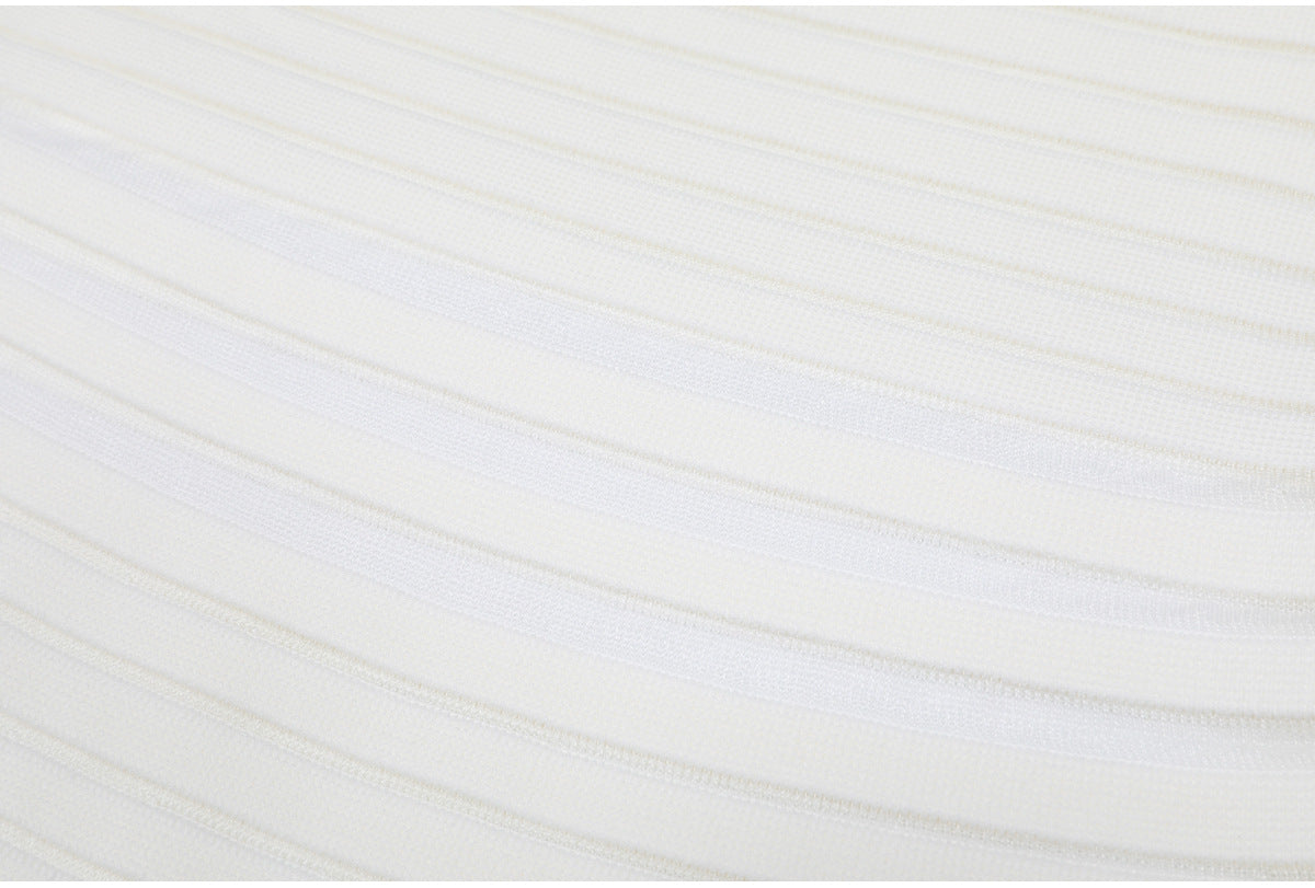 Lower skirt detail of white striped knit dress fabric