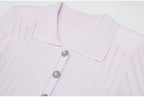 Close-up of lilac ribbed collar and pearl buttons on dress