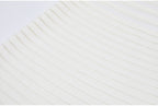 Close-up of white knit fabric with horizontal stripes