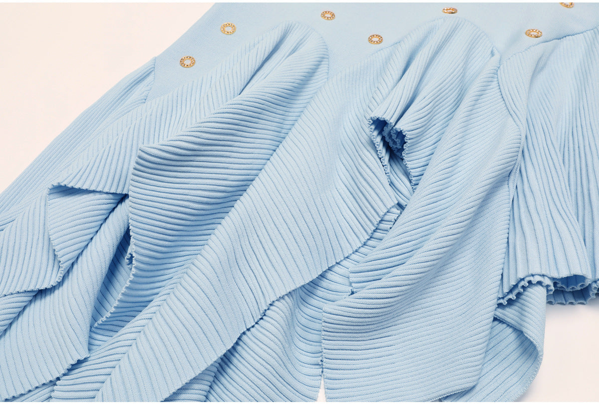 Detailed view of blue pleated ruffle knit fabric