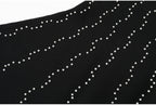 Bottom skirt section of black knit dress with pearl accents