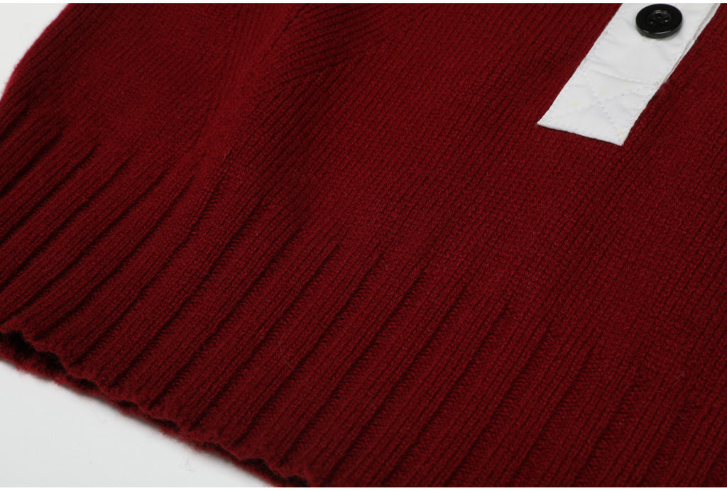 Ribbed hem detail on wine red knit top