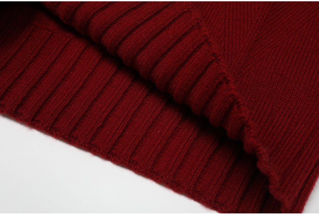 Folded ribbed edge on wine red knit sweater